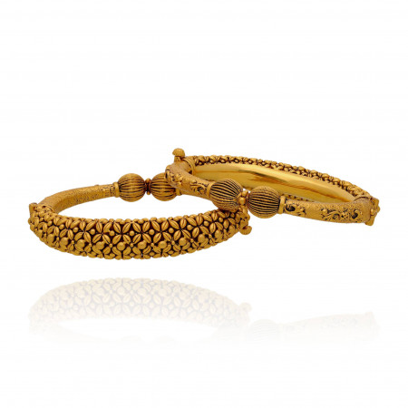 The Essence of Royalty in Every Golden Bangle Creation